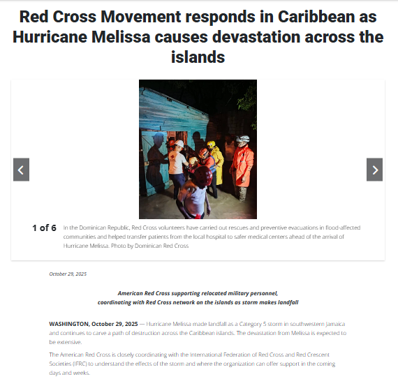 Red Cross volunteers assist masked patients outside a local hospital in the Dominican Republic after Hurricane Melissa’s landfall at night.